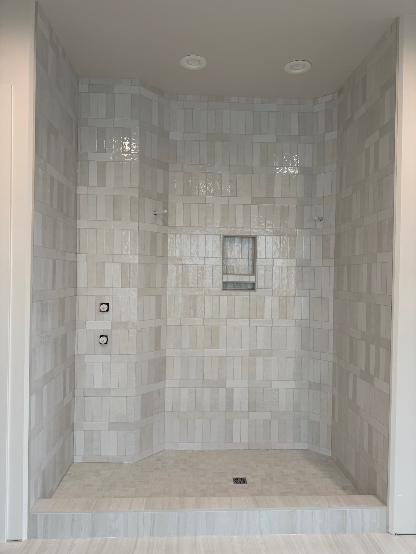 Custom marble walk-in shower installed by Kingdom Tile in the Treasure Valley
