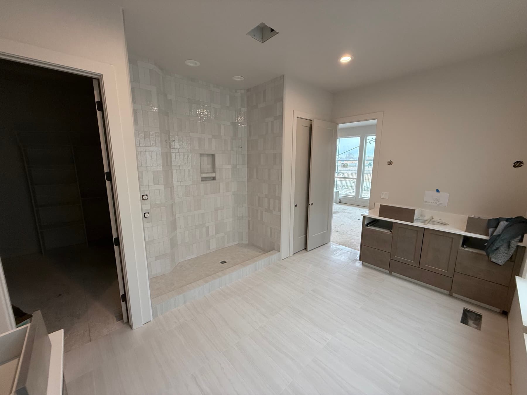New construction wood-look plank tile flooring in a Treasure Valley home