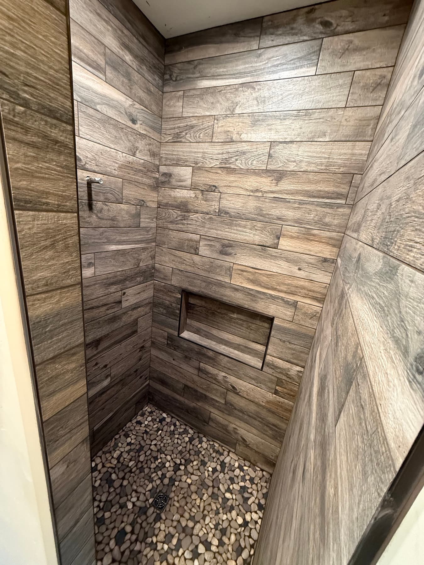 Wood-look tile flooring installed in new construction